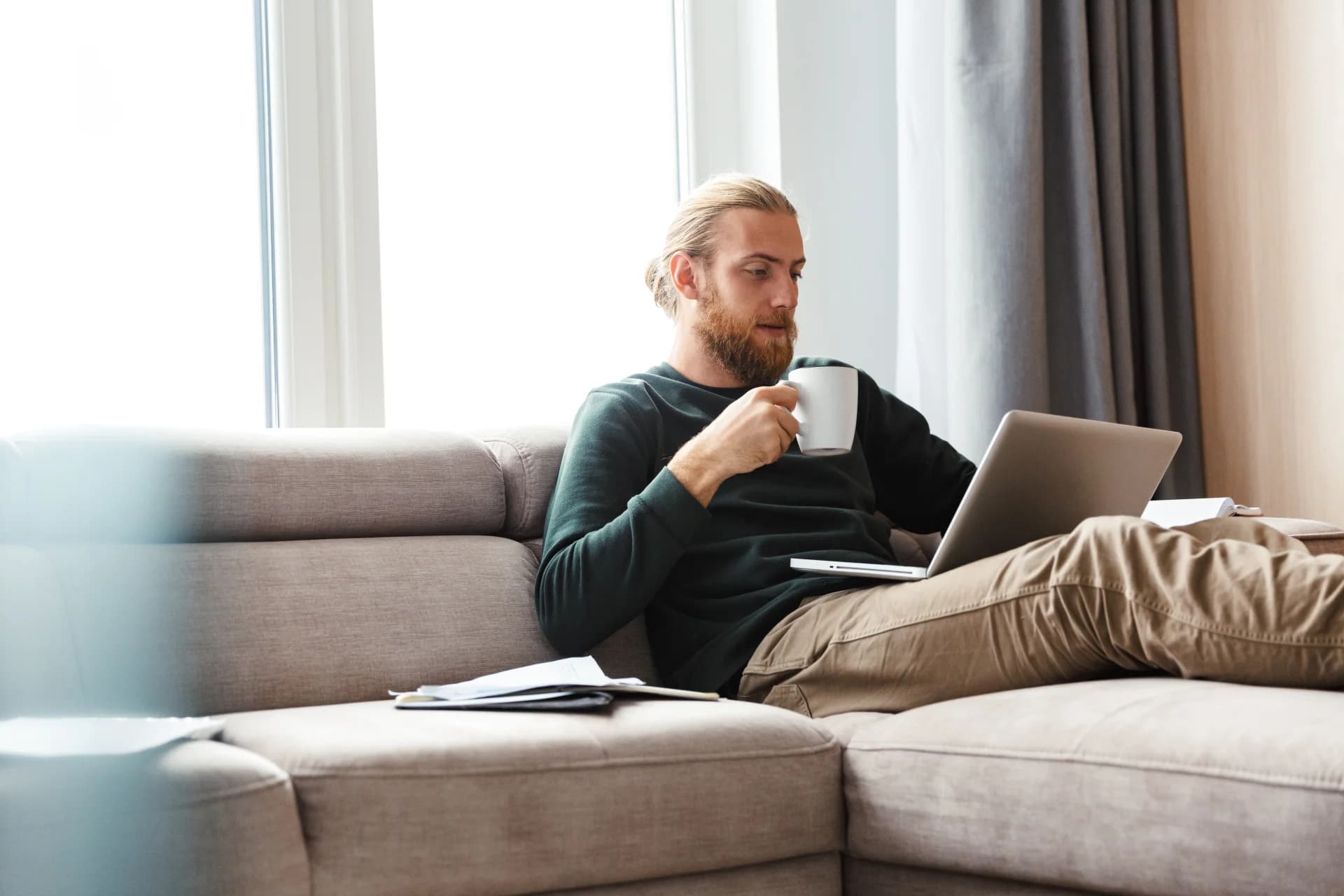 Man researching DVA entitlements on a laptop
