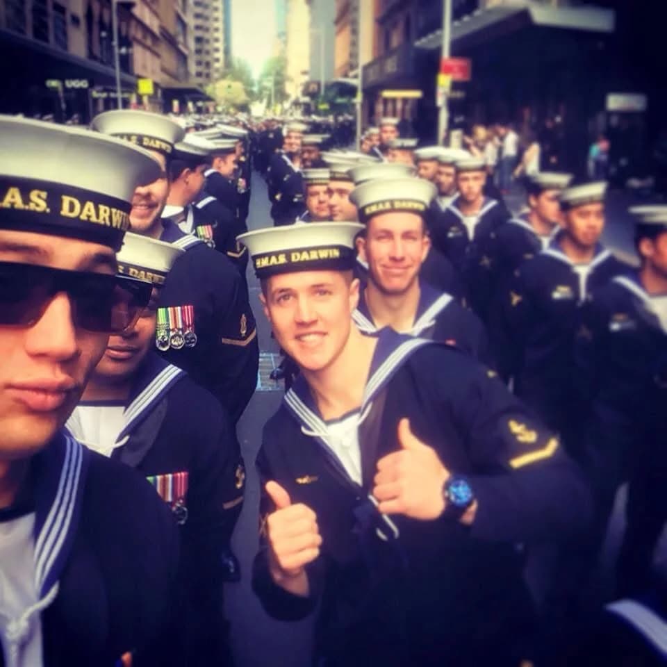 Luke Martin with his crew in Navy uniform